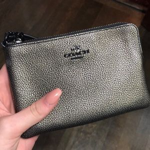bronze metallic coach wristlet